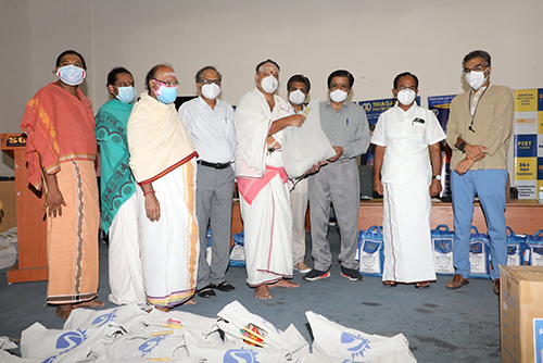 Mr. Valliappa, Mr. Chocko Valliappa & Mr. Thyagu Valliappa provided groceries